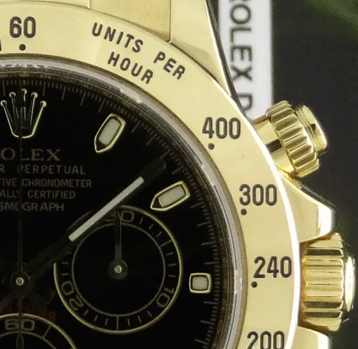ROLEX Rehaut 40mm 18kt Yellow Gold Daytona Black Index Dial Model 116528